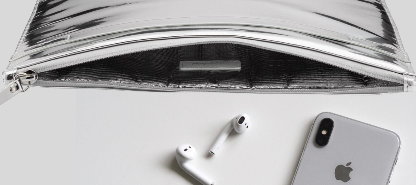 silver-pouch-protecting-iphone-airpods-waterproof-heatproof