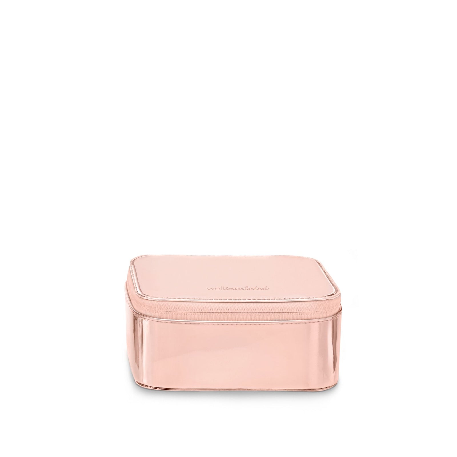 WELLinsulated Performance Mini Travel Case in rose gold, a small structured  insulated case for vitamins, small electronics, and jewelry.
